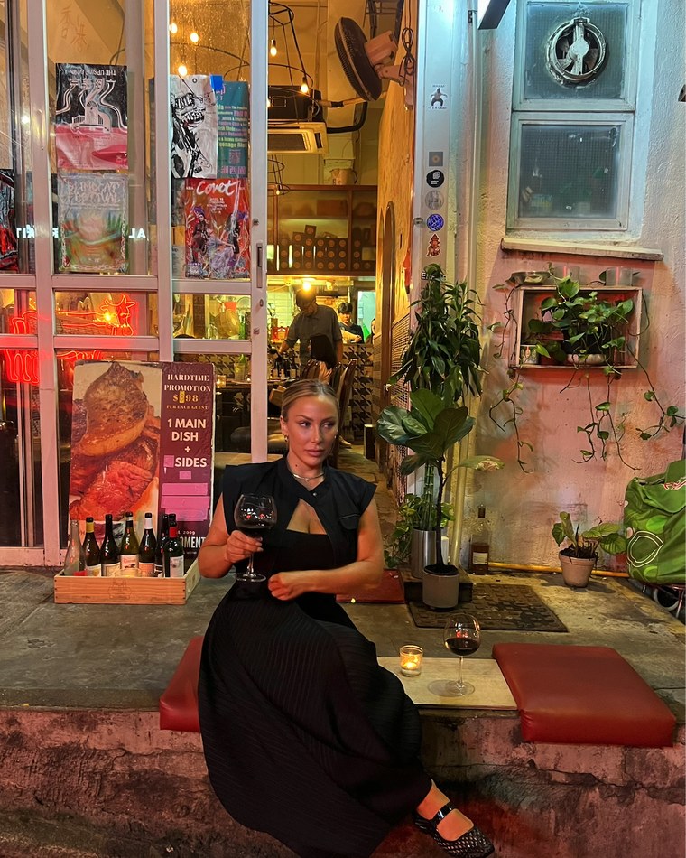 Amanda at a wine bar in Hong Kong