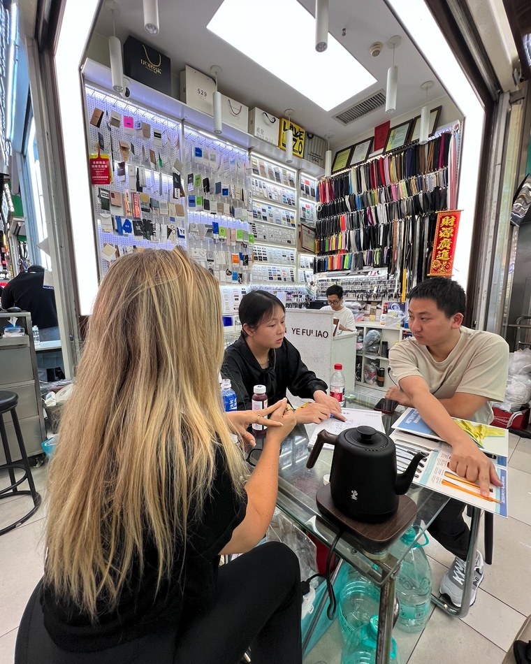 Amanda sourcing trims and materials with suppliers