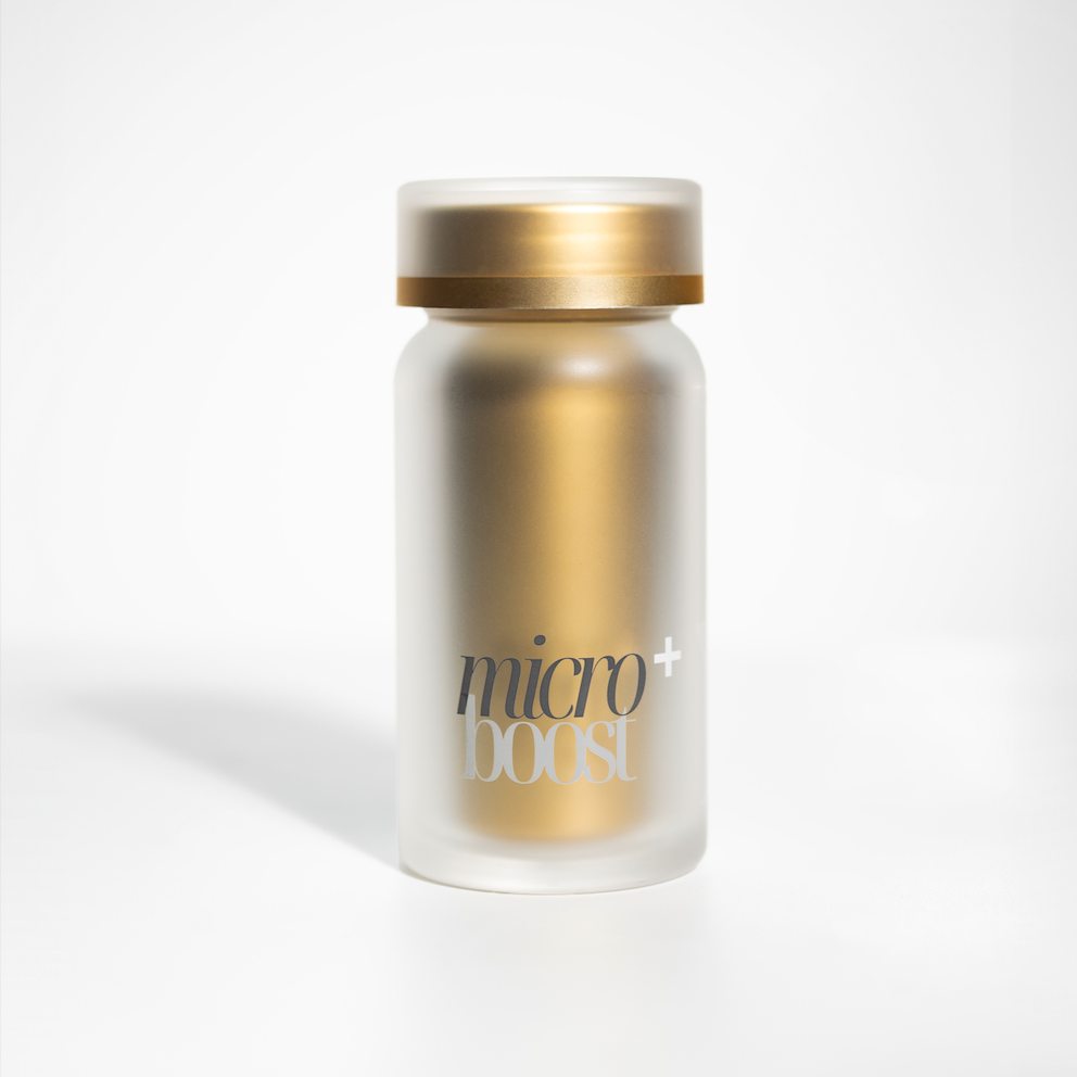 The bottle shot straight on against white